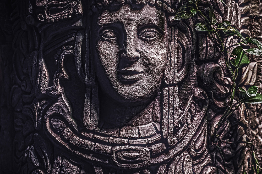 A detailed wood carving that is believed to be linked to the Aztec tribe.
