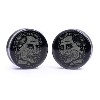 Man wearing awesome salem cat skull acrylic inlay and wood plugs & gauges