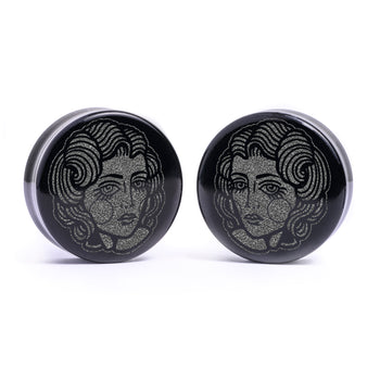 Man wearing awesome salem cat skull acrylic inlay and wood plugs & gauges