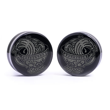 Man wearing awesome salem cat skull acrylic inlay and wood plugs & gauges